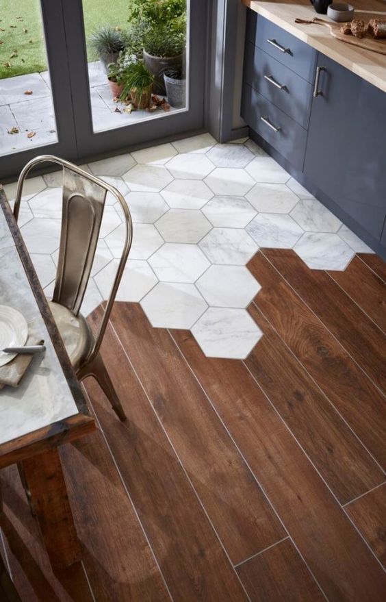 Hexagon tiles meet traditional hardwood floors for a stop-you-in-your-tracks look.