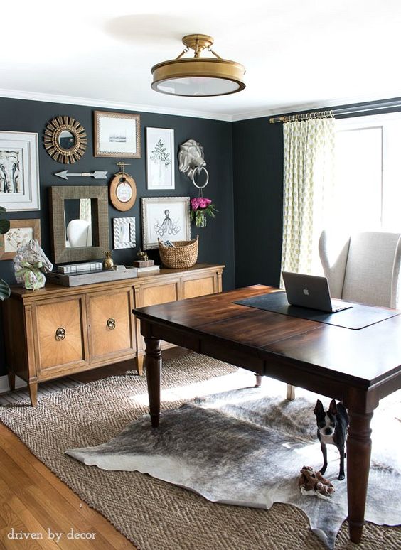 Home office with charcoal gray walls and eclectic gallery wall above a credenza. Post includes full source list!