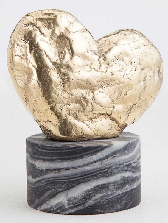 KELLY WEARSTLER | AMORATA SCULPTURE. Hand-sculpted brass heart atop a marble base