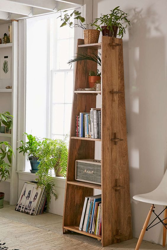 Lean and clean: A rustic wood shelf takes tusk-and-groove construction to a new level. Perfect as a bookcase of display shelf.