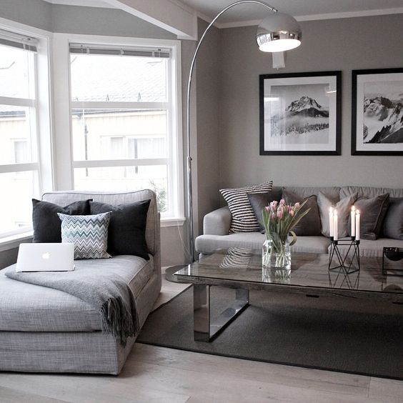 Light grey living room with dark Frames