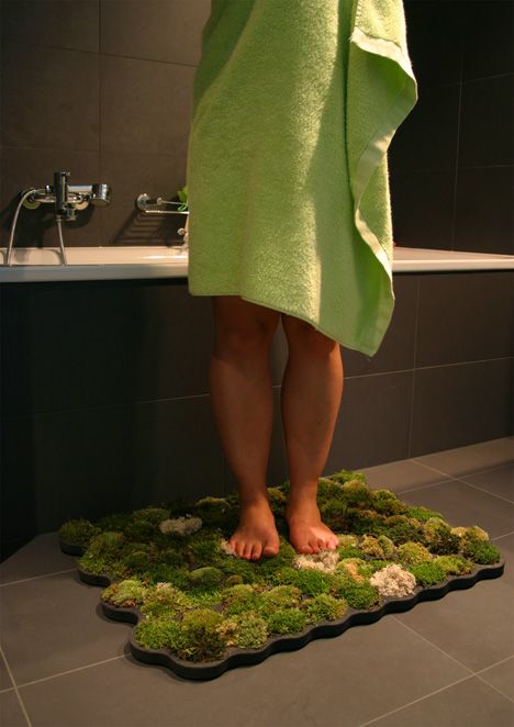 Live moss mat that survives off of the water that you drip off when exiting the shower, WHAT?!  :)