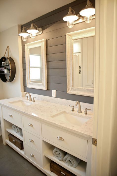 Love the paneling and overall look of this bathroom design.