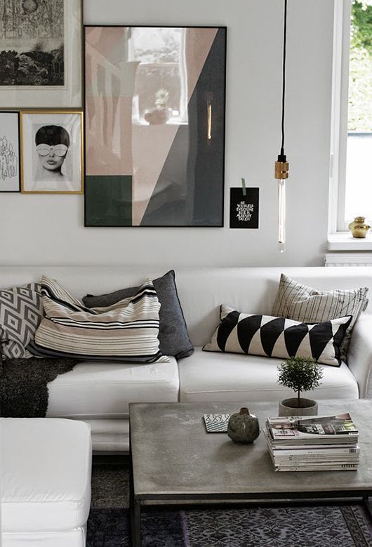 Love this living room with gallery art wall