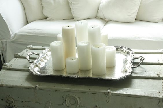 love white candles on silver  on the list for the living room fireplace