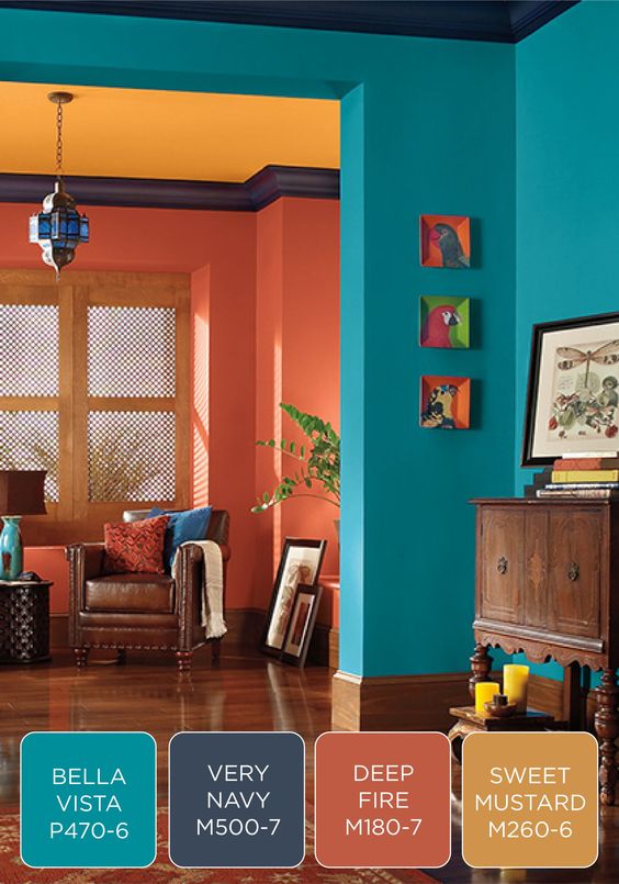 Make a bold statement in your entryway with a colorful BEHR paint palette. Try fresh blue, purple, orange, and yellow colors to greet your guests and give an eclectic feel to your home. | Featured paint: Bella Vista, Very Navy, Deep Fire, and Sweet Mustard.