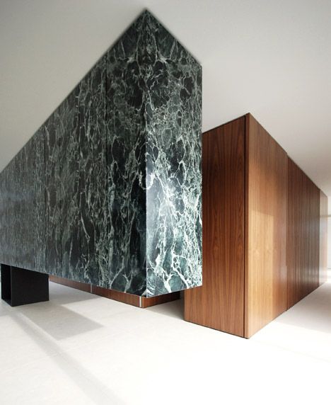 Monolithic marble partition in an Antwerp penthouse