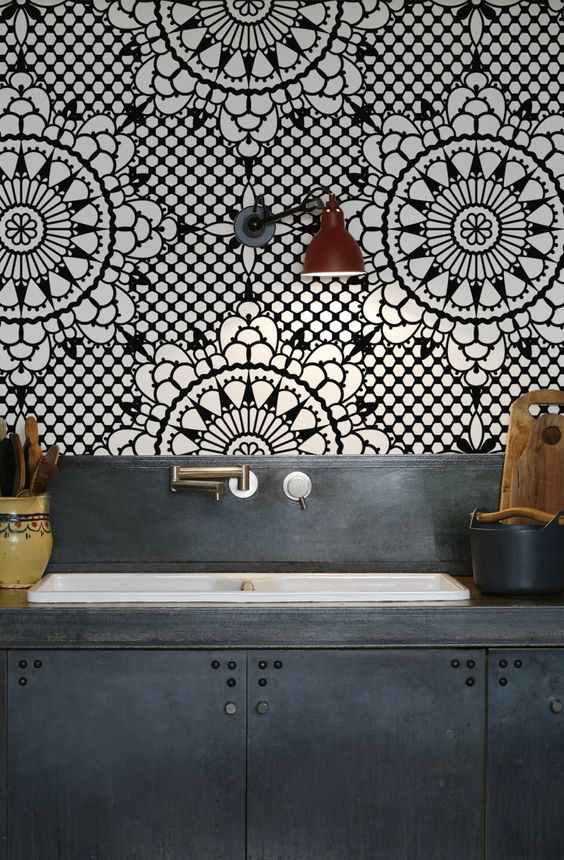 Oriental tiles and blue steel kitchen cabinets