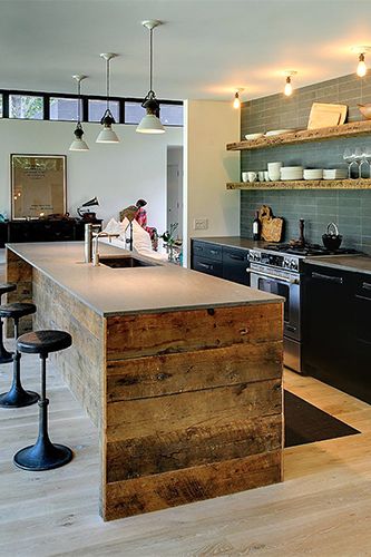 Outstanding kitchen island! Athena Calderone - Vacation Home Decorating Pictures, fine line of rustic and modern.