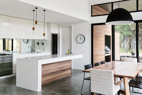 Perfection! Kitchen and dining all open plan, perfect polished concrete floors