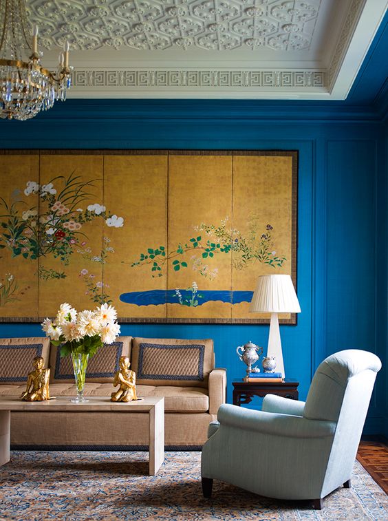 Portfolio | Katie Ridder moulding detail fretwork blue walls living room large scale art tape trim sofa wall