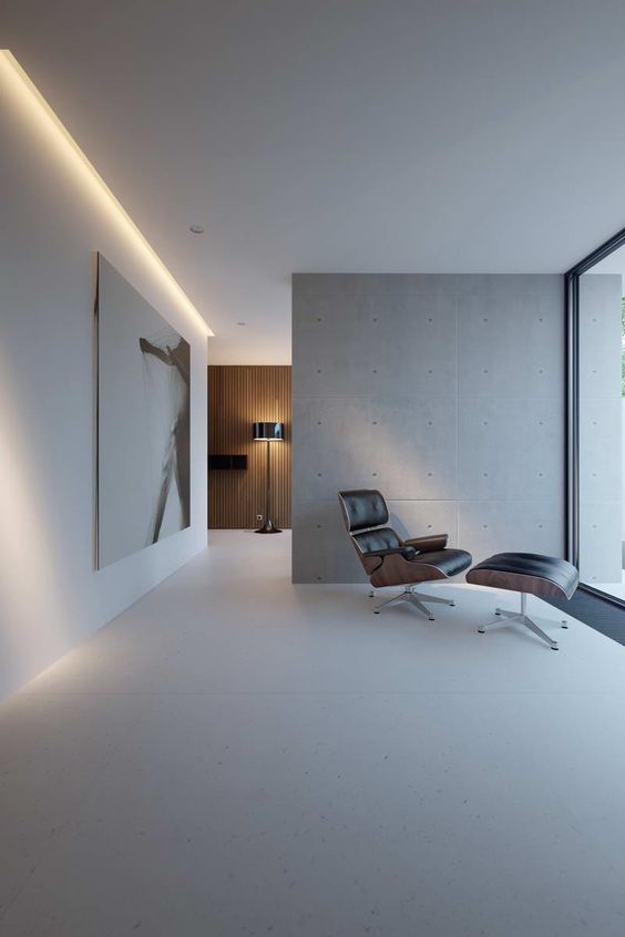 Sometimes all that's needed are some beautiful key  Eames lounge chair & ottoman and Spun floor light from Flos