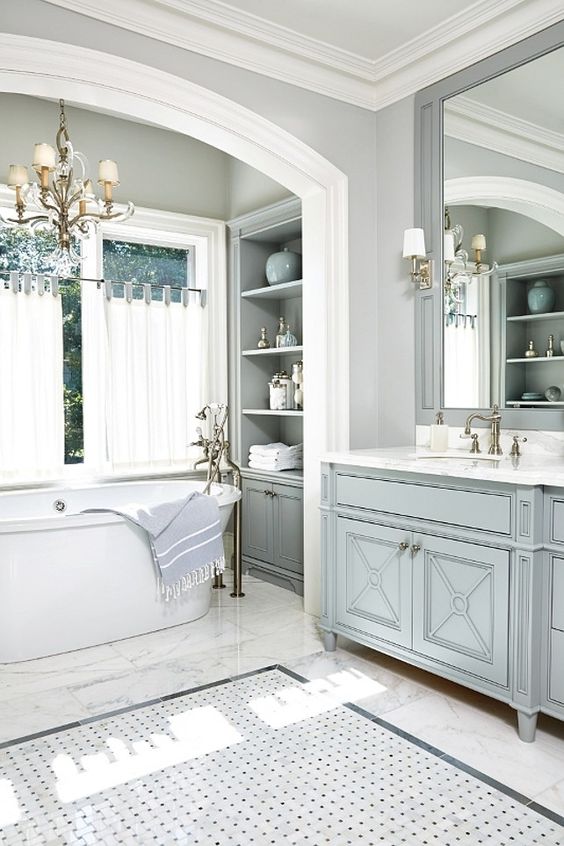 stunning powder blue/grey bathroom, painted vanity, joinery details, marble tiles, lights.