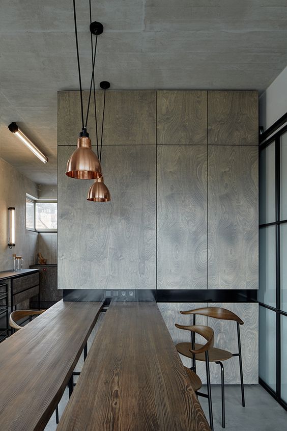 The architect kept the structure's naked concrete ceilings, walls and floors