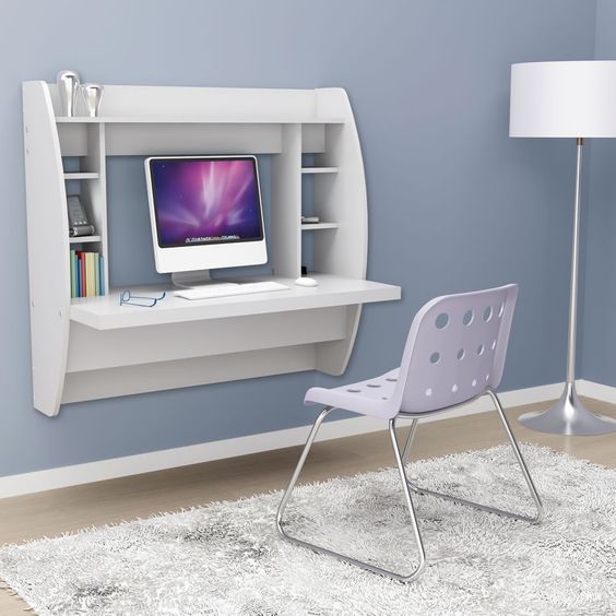 The Wall Mounted Desk from Hammacher Schlemmer. Super great gadget to save room in the house! #Wall #Desk