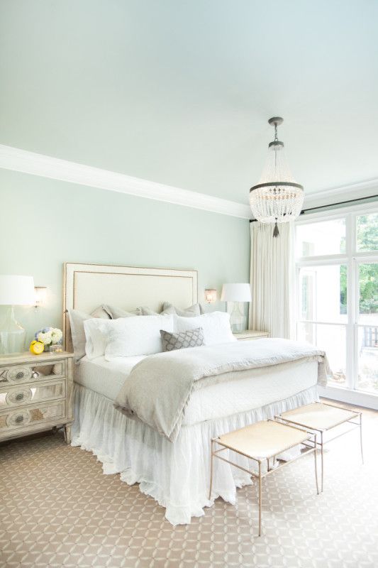 There is nothing more soothing than a bedroom draped in white and sea foam green.