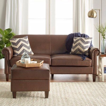 This brown faux-leather sofa that has scroll arms and a library vibe. | 22 Cheap Sofas That Actually Look Expensive