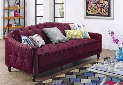 This purple velour fold-down sleeper that has a bold vintage appeal. | 22 Cheap Sofas That Actually Look Expensive