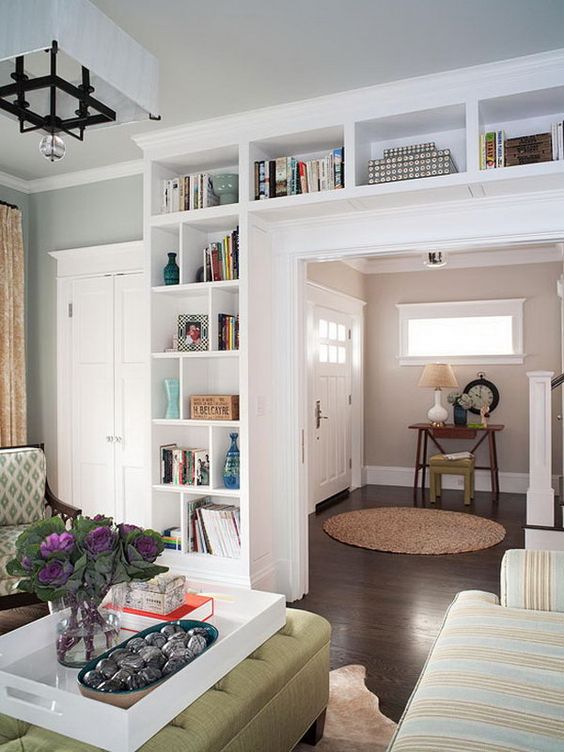 This would be good between kitchen and living room. Here is one more example of built in bookcases. It not only adds a ton of extra character and storage to the house, but they really can make a small house feel so much bigger! See more instructions