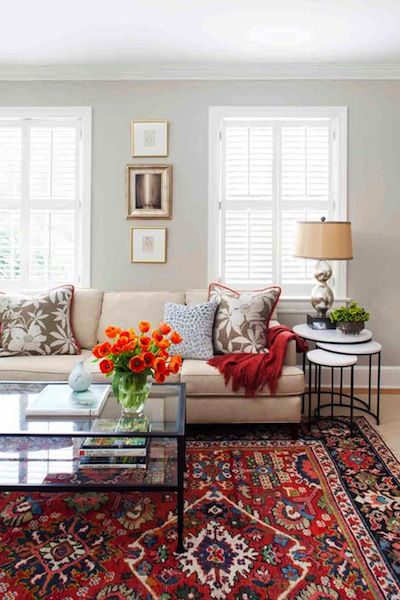 Transitional living room with oriental rug, custom textiles and nesting tables.