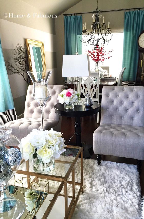 Tufted chairs from HomeGoods make any living room look elegant (sponsored pin)