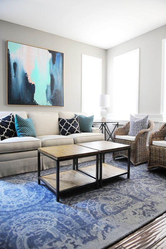 A great piece of art, like this piece from HomeGoods can transform a room. Use it as your statement piece and choose pillows and other accessories based on the colors in the artwork. Sponsored pin.