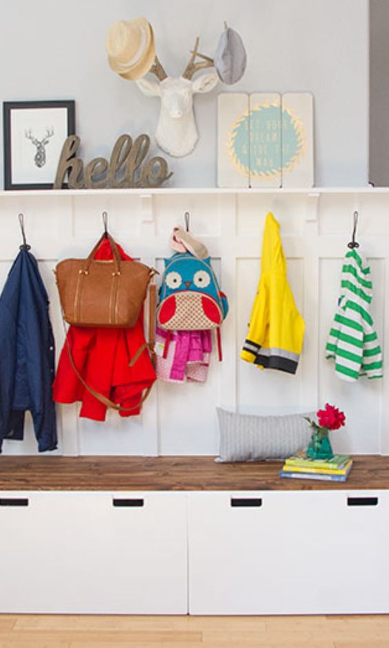 Add extra coat hooks to your entryway's bench in this IKEA hack.