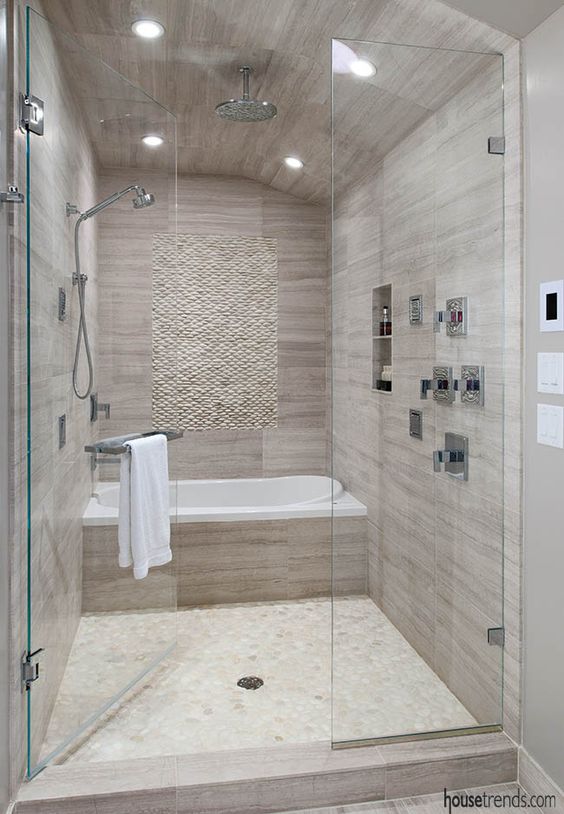 Bathroom design brings two spaces  in the shower??!! Wonderful!