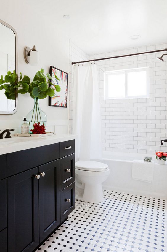 Black and White Bathroom with subway tile shower, interesting tile detail around window