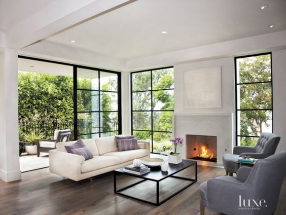 Contemporary White Living Room With Tiled Fireplace