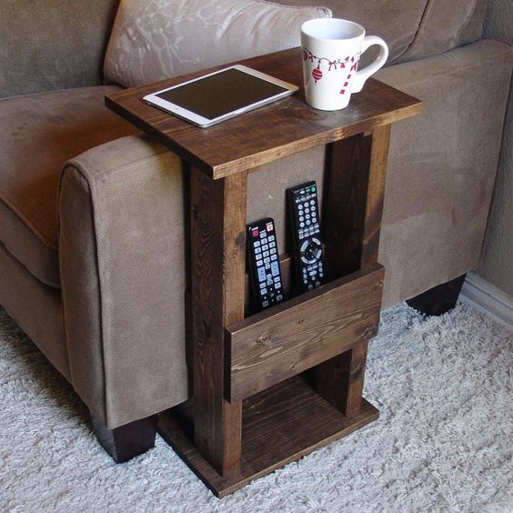 Handcrafted tray table stand with storage pocket. The perfect addition to a sofa chair in any home, apartment, condo, or man cave. It has been sanded