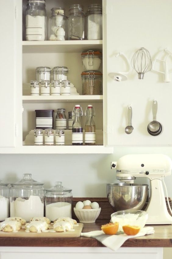 Hang smaller items like measuring spoons on the inside of your cabinets doors to ensure they'll always be within easy reach.