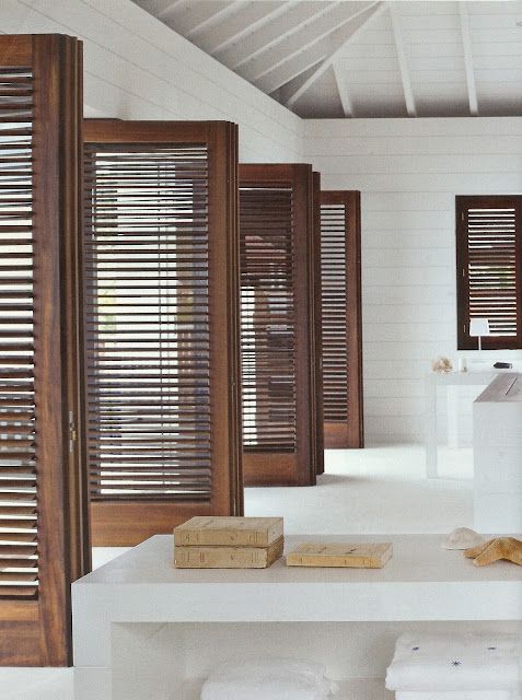louvered doors lend an inviting casual comfort to any space - the rest of this space is austere