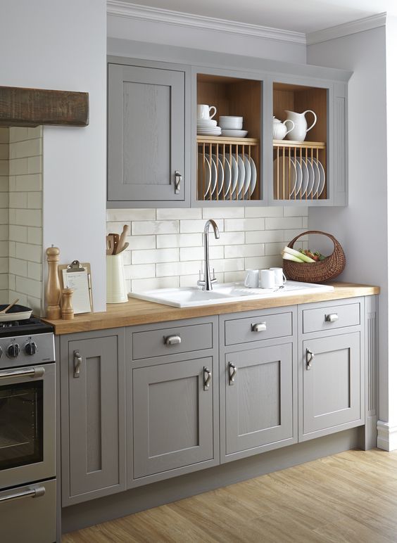 Our Carisbrooke taupe kitchen is incredibly sophisticated with its refined woodwork and warm grey tones creating the perfect fusion for creating a welcoming space.