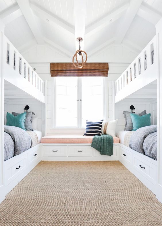 The homeowners wanted a fun retreat to house all their grandkids, and four built-in bunk beds proved the perfect solution. The kids' bedroom expertly incorporates the home's beach location into its design, so the space is just as beautiful as it is functional.