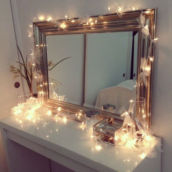 Vanity setup! Ikea vanity with Christmas lights, decorated in ribbons!