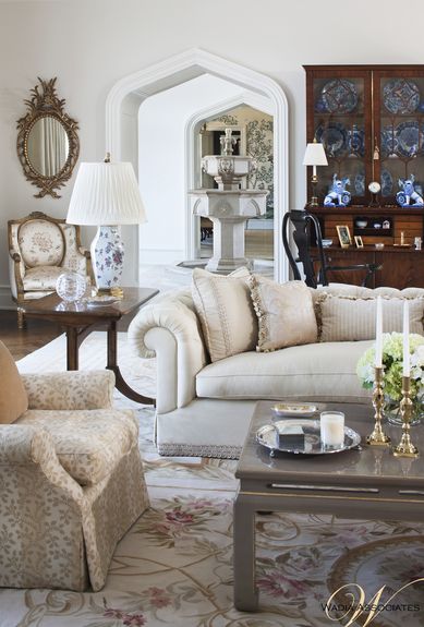Wadia Associates - Architect - New Canaan - Neoclassical - Family Room - Living Room - White - Floral Rug - Sofa - Coffee Table - Candelabra - Gold Mirror - Luxe - White - Display - China - Lamps - Gold - Houseware