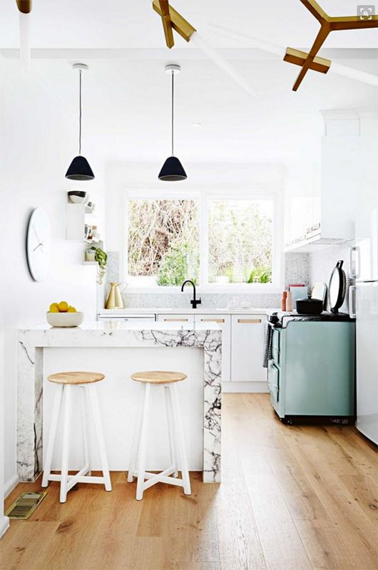 While super-modern kitchens are also very lovely, lately we've been seeing a lot of stylish kitchens that incorporate one or more vintage elements. Whether it's a vintage-style stove or refrigerator or a antique pie safe, adding something old (or something that just looks old) to your kitchen will give it an intriguing dose of texture and history.