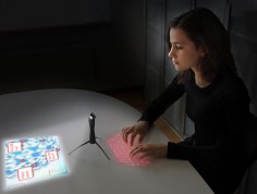 A full size keyboard and screen, projected by your phone. The Spider Computer by Nikolaus Frank