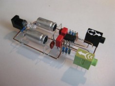 A handmade headphone amplifier soldered together without a circuit board, but component to component.
