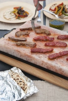 A Himalayan pink salt slab that you can actually heat up and cook on top of while also seasoning your food.