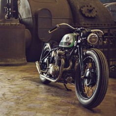 A Honda CB550 with girder forks? And an old Zündapp gas tank? Looks like they’re smoking something strong in Amsterdam. This raw, industrial-looking build comes from Tin Can Customs, and wowed the punters at the recent Cosmic Nozems motorcycle show.