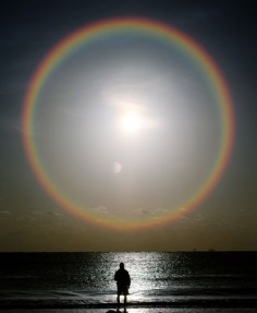 a perfect rainbow around a full moon Amazing & 