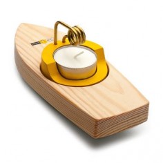 A teeny wooden steamship that actually works! (You light the tea candle.)