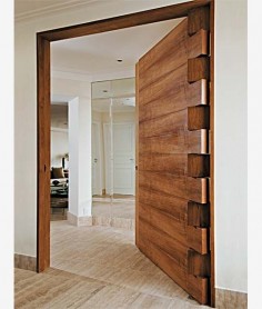 Absolutely love the hinge work and solid timber door. Would make an awesome front door.