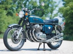 At the heart of the Honda CB750 motorcycle was an inline four-cylinder engine with single overhead cam, four carburetors, prominent four-into-four exhaust, and 67 horsepower at 8000 rpm.