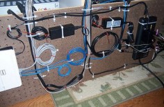 cable management using pegboard + tie wraps (attach to underside/backside of furniture)