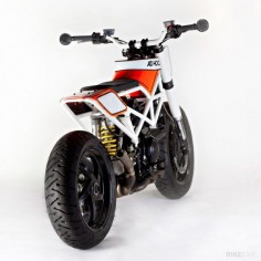 Ducati Multistrada by Ad Hoc - Fat bars, bar ends, imagination, and 1000cc of skinny bike