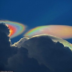 Fire rainbow cloud: The rare phenomenon appeared behind a storm cloud near Delray Beach, Florida