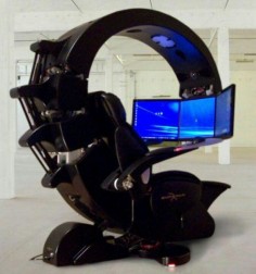 future gaming system. Does it come in 3D? Emperor Workstation A massive techno-womb designed to cradle you in ergonomic comfort, the Emperor workstation features three widescreen monitors: THX Dolby surround sound, air filtering, light therapy, a Web cam, battery back-up and many other things to help you fantasize about being a tyrannical army commander controlling a galaxy takeover.